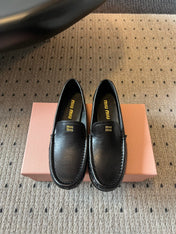 MIUMIU 26S LOAFERS IN BLACK CALFSKIN