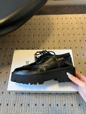 CELINE 26S SAINTNJORD TASSEL LOAFER 50 MM IN BLACK CALFSKIN