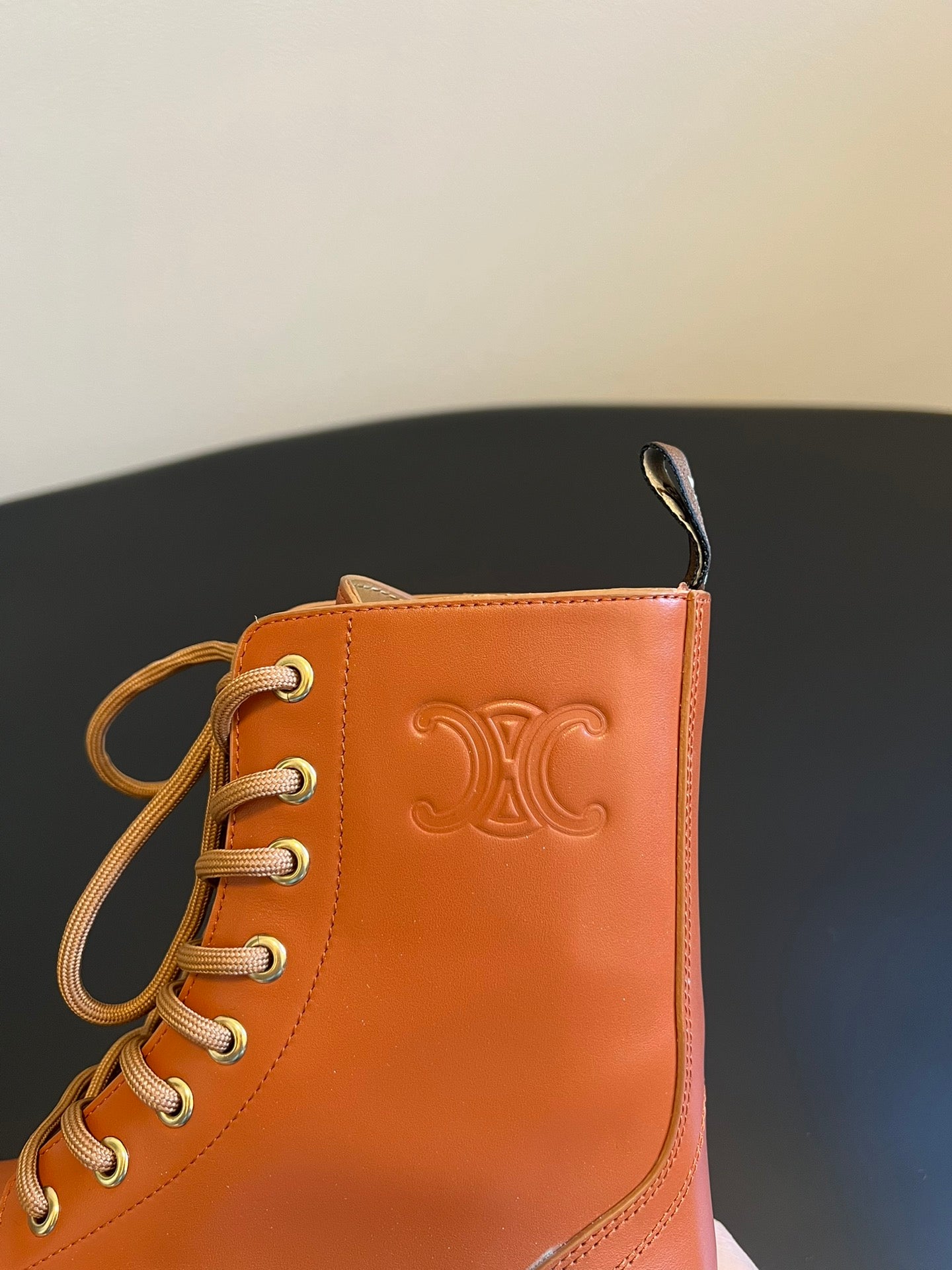 CELINE 26S MARGARET COMBAT BOOT 45 MM IN BURNT ORANGE CALFSKIN