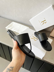 THE ROW 26S FLAT THONG SANDALS IN BLACK CALFSKIN