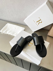 THE ROW 26S FLAT THONG SANDALS IN BLACK CALFSKIN