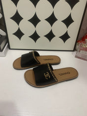 CHANEL 26S SANDALS IN BLACK CALFSKIN GOLD-TONE CHAIN DETAIL