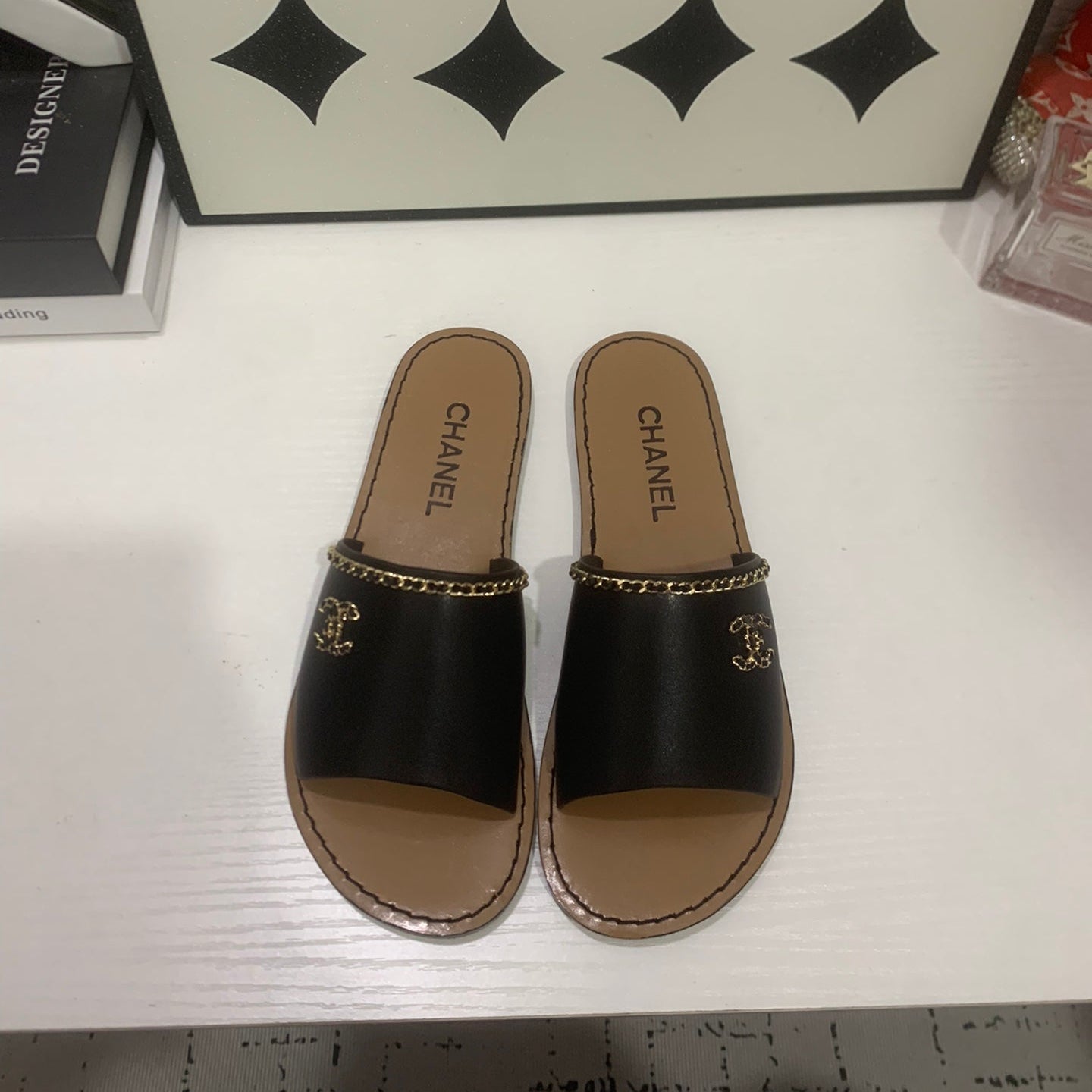 CHANEL 26S SANDALS IN BLACK CALFSKIN GOLD-TONE CHAIN DETAIL