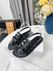 THE ROW 26S MINIMAL STRAPPY FLAT SANDALS IN BLACK CALFSKIN