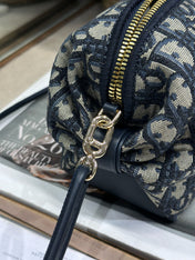 DIOR 26S BOW POUCH BAG 20 IN BLACK AND BEIGE OBLIQUE JACQUARD