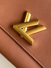 SOFT TWIST 27 IN COGNAC CALFSKIN GOLD LOGO