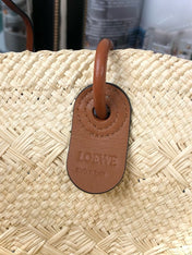MEDIUM ANAGRAM BASKET BAG 46 IN BEIGE IRACA PALM AND TAN CALFSKIN