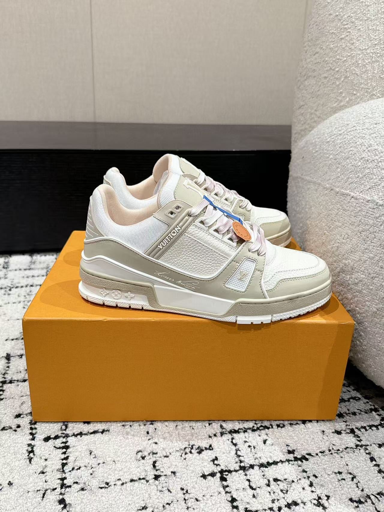 LV TRAINER SNEAKERS IN WHITE CALFSKIN