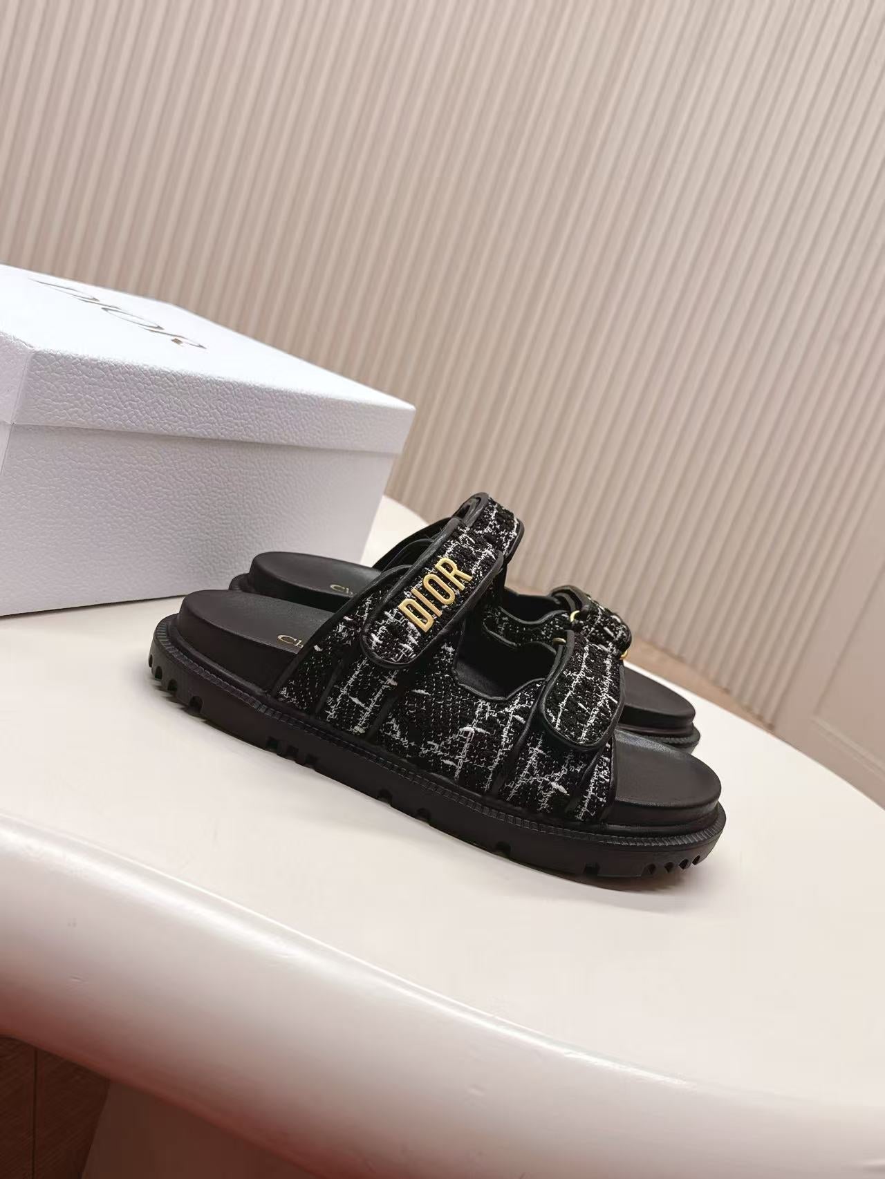 DIORACT SANDALS IN BLACK TWEED WITH GOLD LOGO BUCKLE