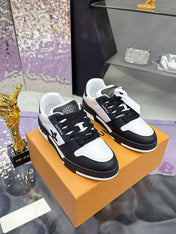 LV TRAINER SNEAKERS IN BLACK AND WHITE CALFSKIN