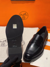 HM PARIS LOAFERS IN BLACK CALFSKIN WITH CLASSIC PENNY STRAP DESIGN