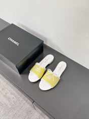 CC STRIPED SLIDE SANDALS IN YELLOW AND WHITE CANVAS