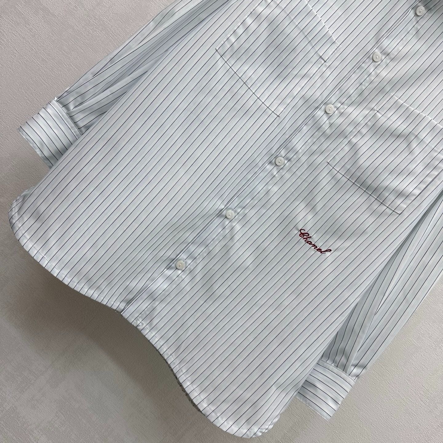 CHANEL STRIPED EMBROIDERED LOGO SHIRT WITH VERTICAL STRIPES