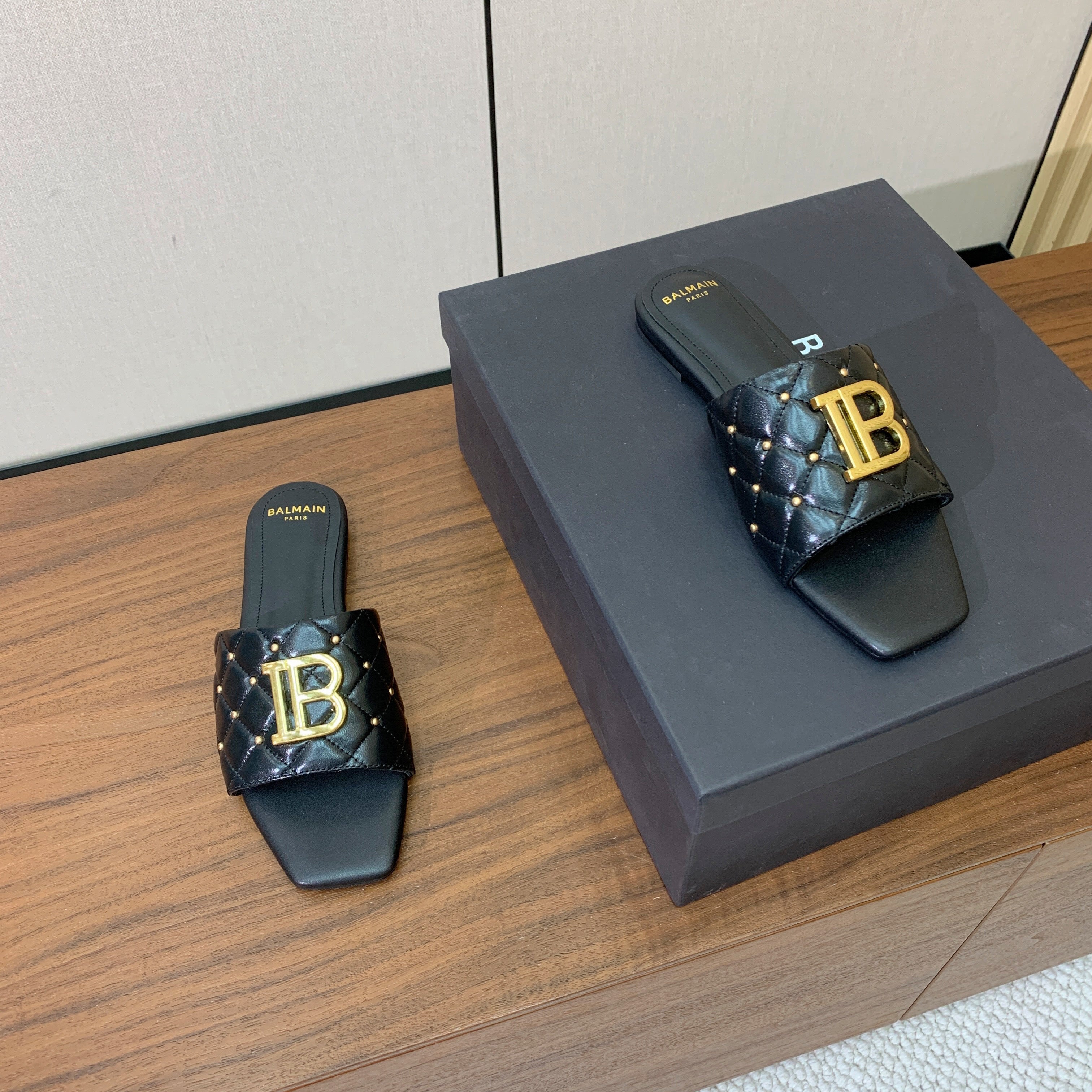 BALMAIN 26S QUILTED MULES IN BLACK CALFSKIN