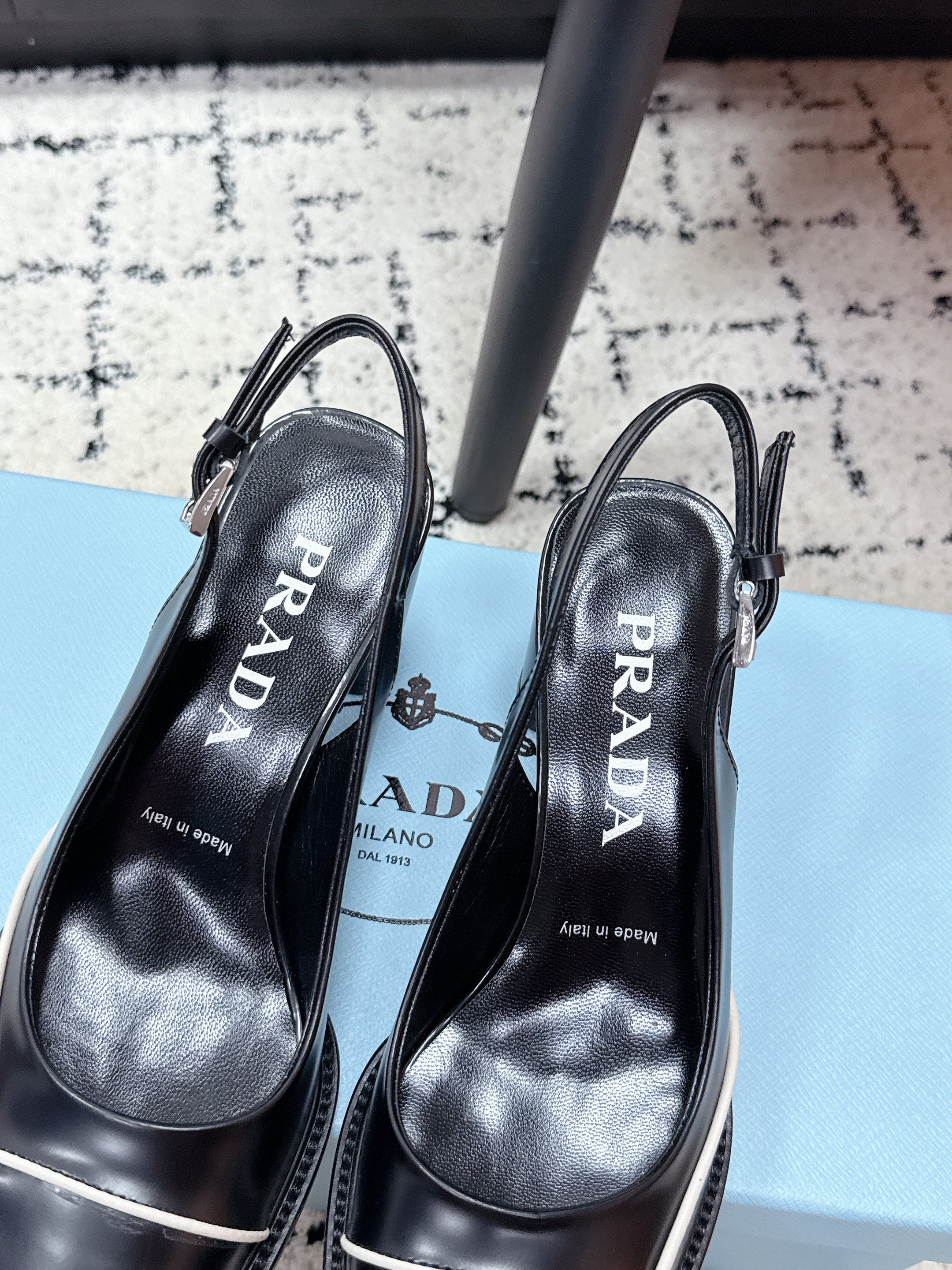 PRADA 26S SLINGBACK PUMPS 70MM IN BLACK SHINY CALFSKIN