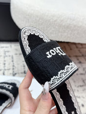 DIOR 26S SLIDES IN BLACK AND WHITE EMBOSSED OBLIQUE LACE EMBROIDERY