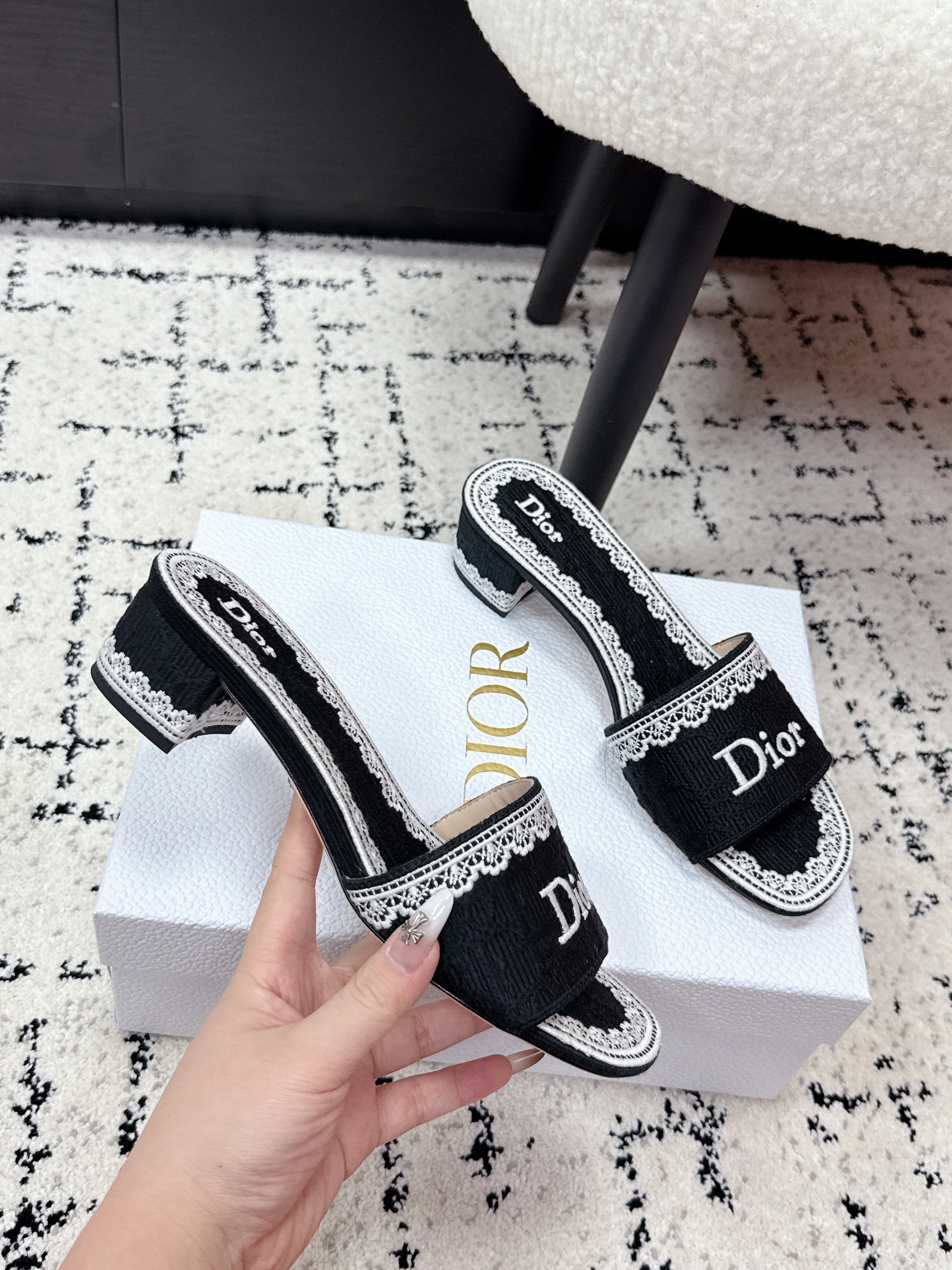 DIOR 26S HIGH HEEL SLIDES IN BLACK AND WHITE EMBOSSED OBLIQUE LACE EMBROIDERY