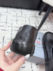 PRADA 26S SLIP ON SHOES IN BLACK SMOOTH CALFSKIN