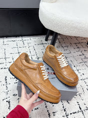 PRADA 26S SNEAKERS IN GOLDEN BROWN SHINY CALFSKIN