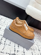 PRADA 26S SNEAKERS IN GOLDEN BROWN SHINY CALFSKIN