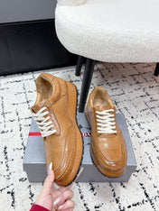 PRADA 26S SNEAKERS IN GOLDEN BROWN SHINY CALFSKIN