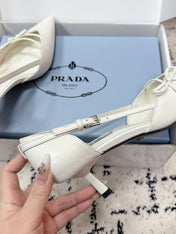 PRADA 26S POINTED-TOE HIGH HEELS 55MM IN WHITE CALFSKIN WITH BOW