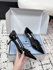 PRADA 26S POINTED-TOE HIGH HEELS 55MM IN BLACK PATENT CALFSKIN WITH BOW
