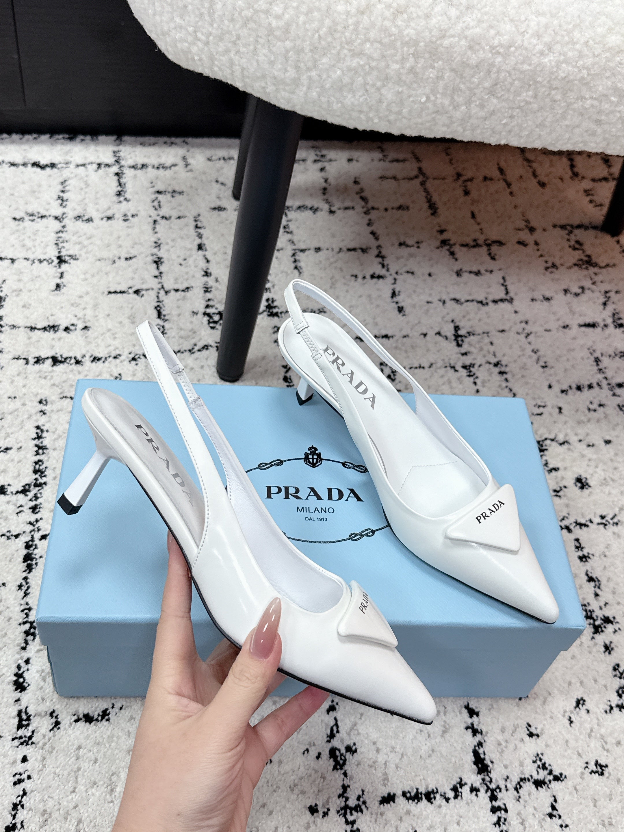 PRADA 26S SLINGBACK PUMPS 60MM IN WHITE PATENT CALFSKIN