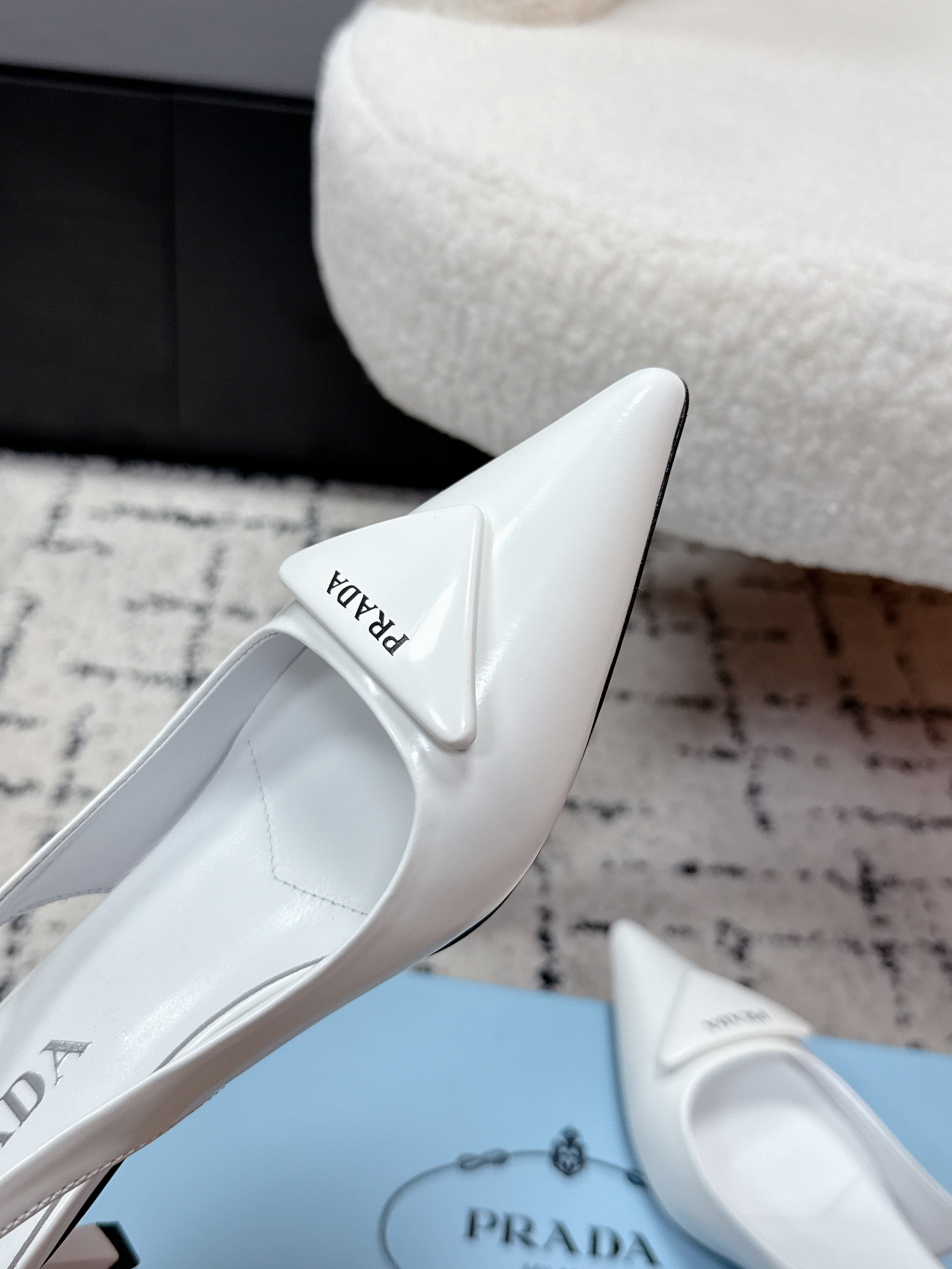 PRADA 26S SLINGBACK PUMPS 60MM IN WHITE PATENT CALFSKIN