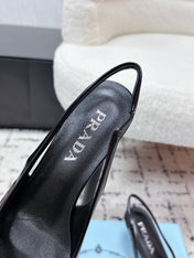 PRADA 26S SLINGBACK PUMPS 60MM IN BLACK PATENT CALFSKIN