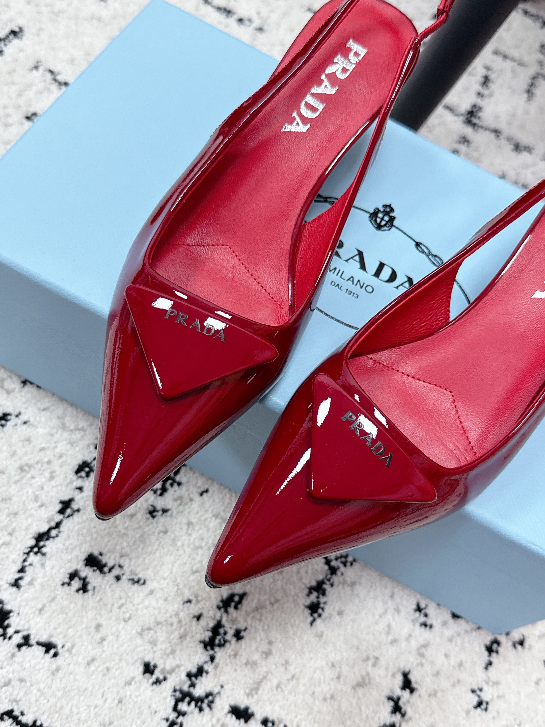 PRADA 26S SLINGBACK PUMPS 60MM IN DARK RED PATENT CALFSKIN