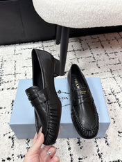 PRADA 26S LOAFERS 25MM IN BLACK CALFSKIN