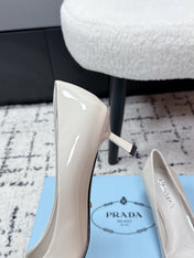 PRADA 26S POINTED-TOE HIGH HEELS 60MM IN CREAM WHITE PATENT CALFSKIN WITH LOGO