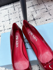 PRADA 26S POINTED-TOE HIGH HEELS 60MM IN DARK RED PATENT CALFSKIN WITH LOGO