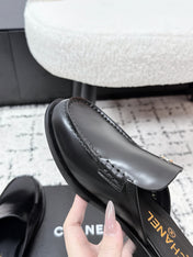 CHANEL 26S MULE LOAFERS IN BLACK SMOOTH CALFSKIN WITH CC LOGO