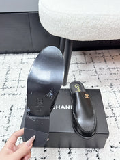 CHANEL 26S MULE LOAFERS IN BLACK SMOOTH CALFSKIN WITH CC LOGO