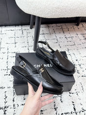 CHANEL 26S SLINGBACK LOAFERS IN BLACK PATENT CALFSKIN WITH CC LOGO
