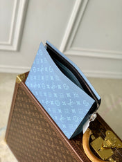 POCHETTE VOYAGE 26 IN LIGHT BLUE MONOGRAM ECLIPSE CALFSKIN