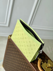 POCHETTE VOYAGE 26 IN LEMON YELLOW MONOGRAM ECLIPSE CALFSKIN