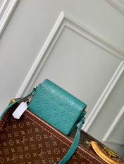 STEAMER WEARABLE WALLET 18 IN TEAL GREEN MONOGRAM TAURILLON CALFSKIN