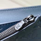 POCHETTE VOYAGE 22 IN DARK BLUE MONOGRAM SHADOW CALFSKIN