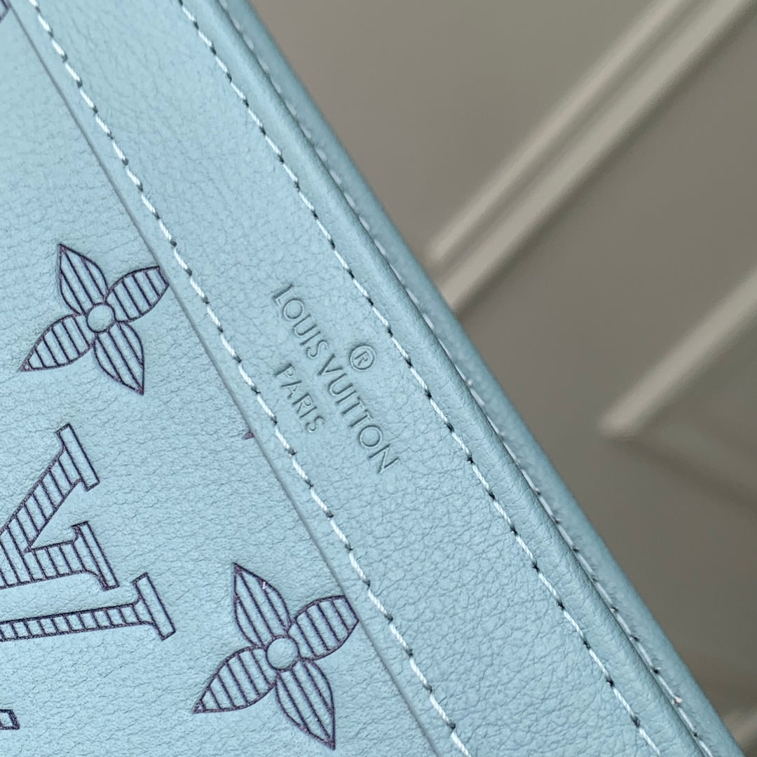 GASTON WEARABLE WALLET 22 IN SKY BLUE MONOGRAM SHADOW CALFSKIN EMBOSSED LOGO
