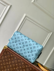 DOPP KIT 28 IN SKY BLUE MONOGRAM SHADOW CALFSKIN EMBOSSED LOGO