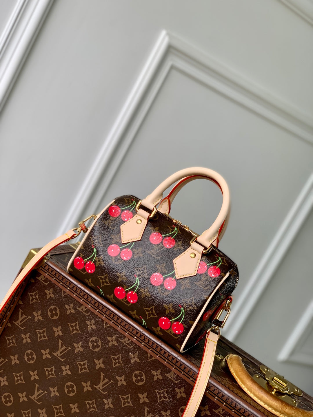 SPEEDY BANDOULIÈRE 20.5 BAG IN BROWN CANVAS CHERRY PRINTED