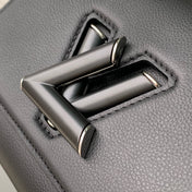 TWIST SLIM 19 IN BLACK TAURILLON CALFSKIN WITH PEARL CHAIN