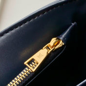 TWIST SLIM 19 IN NAVY BLUE TAURILLON CALFSKIN GOLD HARDWARE