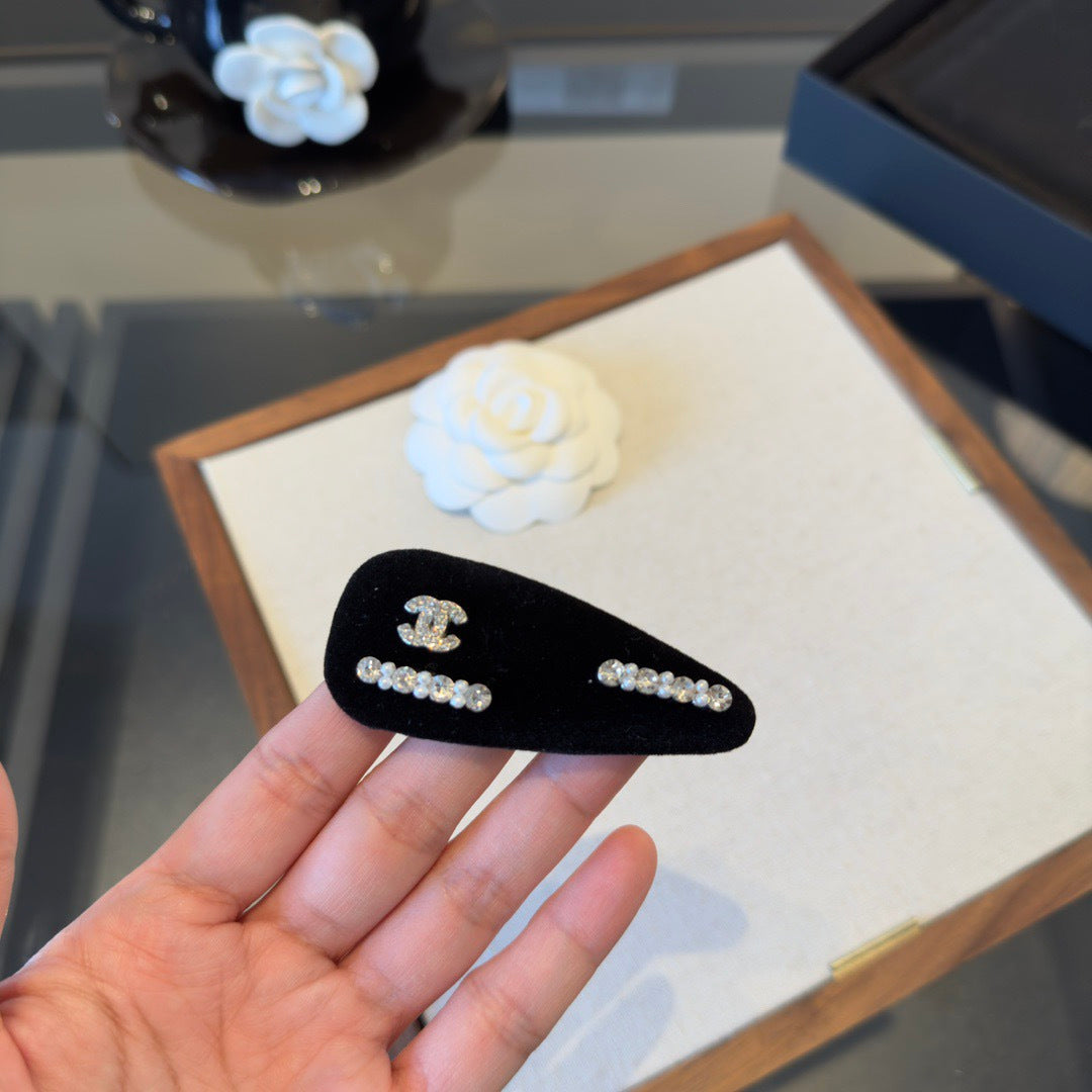 CHANEL 26S HAIR CLIP IN BLACK METAL 503045