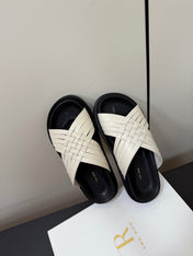 THE ROW 26S CROSS STRAP SANDALS IN IVORY WHITE CALFSKIN