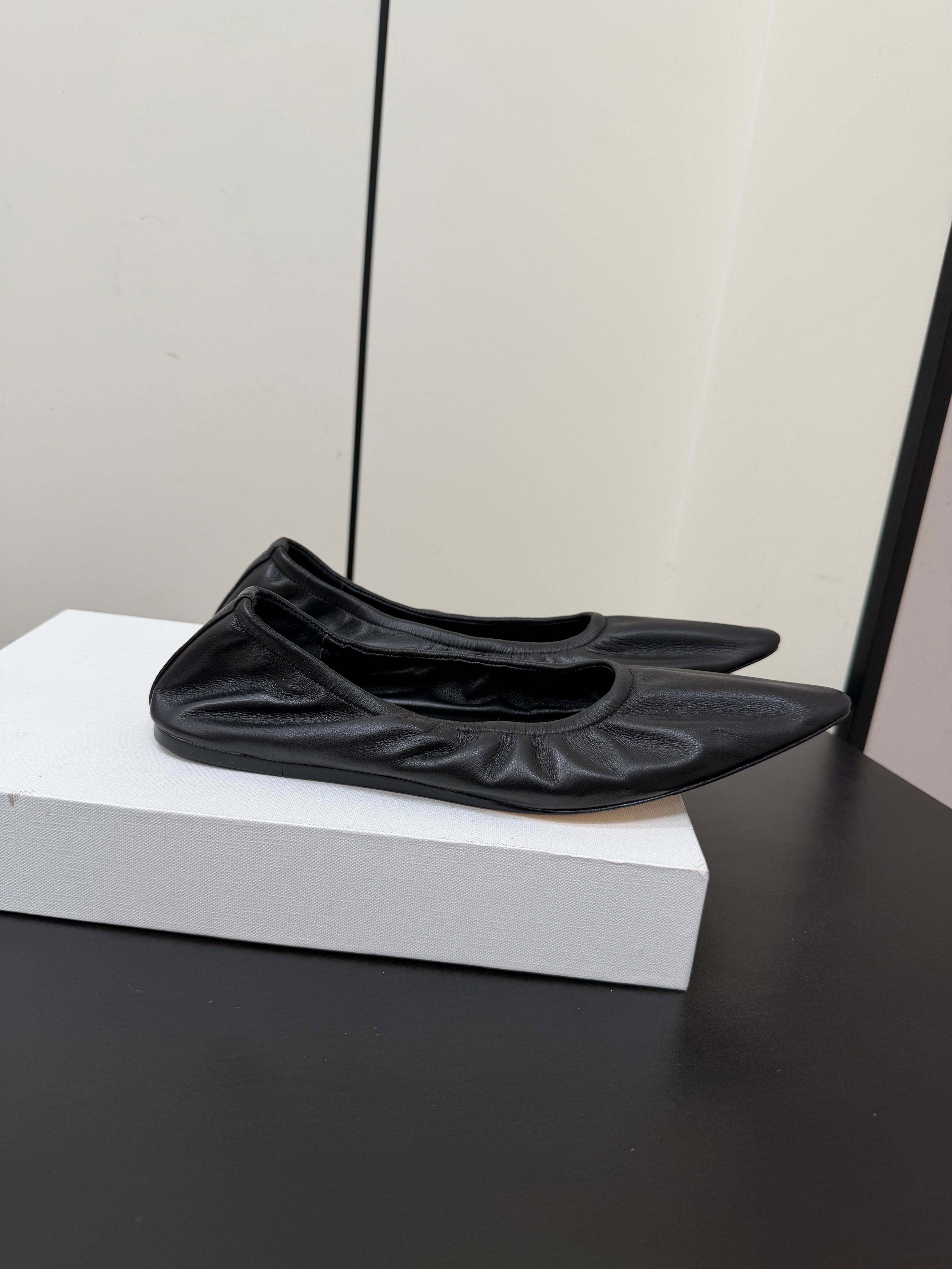 THE ROW 26S POINTED TOE BALLET FLATS IN BLACK LAMBSKIN