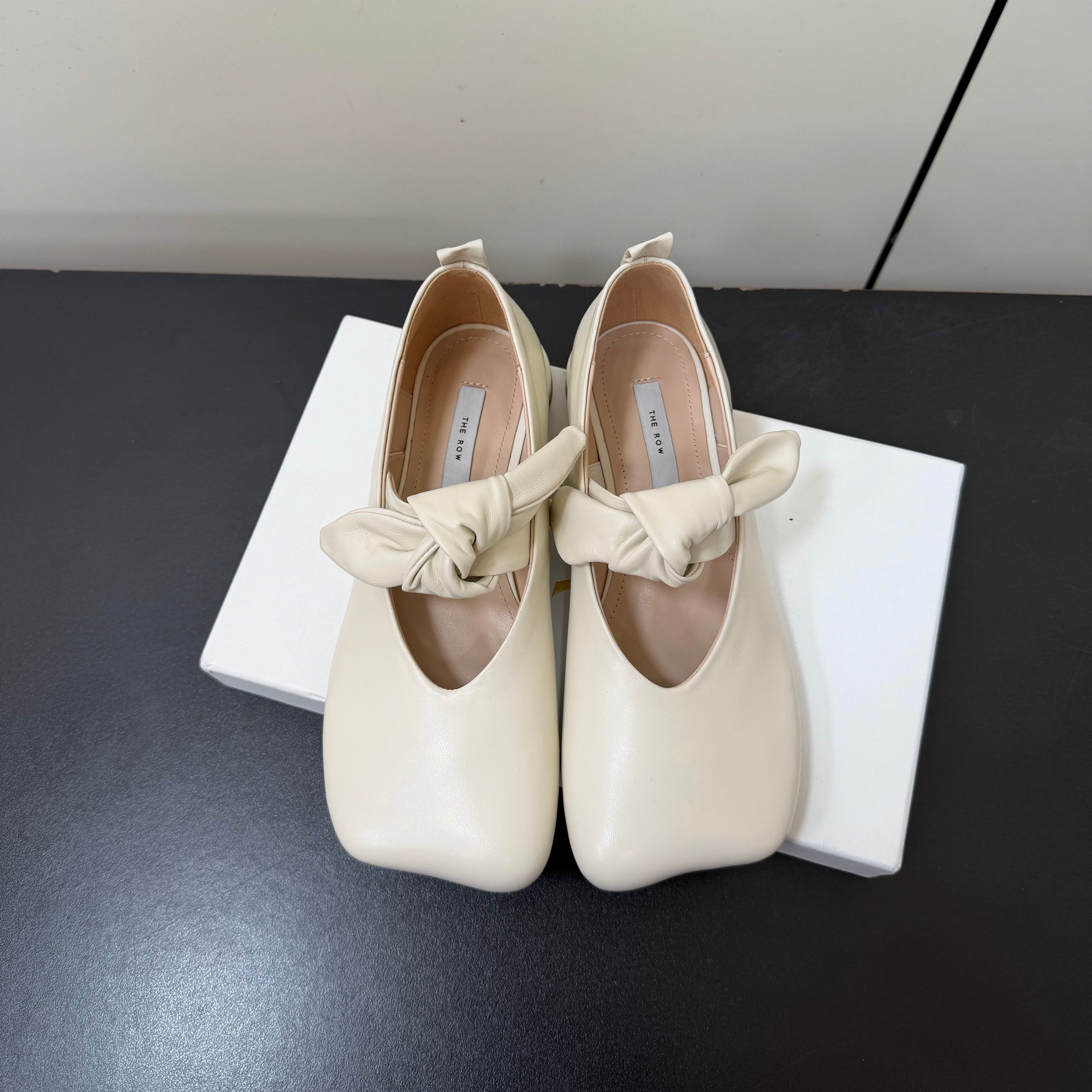 THE ROW 26S BALLET FLATS IN IVORY WHITE KNOT DETAIL CALFSKIN WITH SQUARE TOE